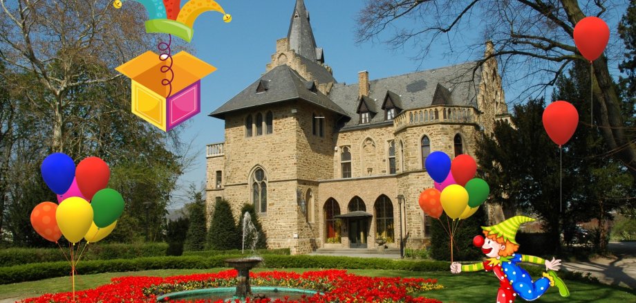 Das Foto zeigt das Schloss Sinzig mit Karnevalsmotiven.
