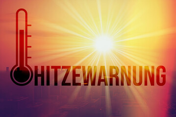 Hitzewarnung Das Foto zeigt die Sonne, ein Thermometer und das Wort Hitzewarnung.